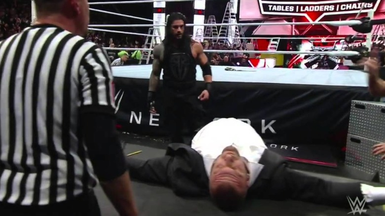Triple H knocked out on the table