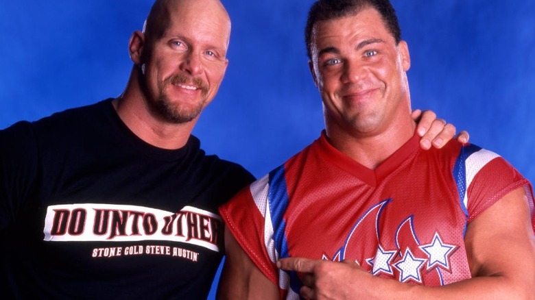Steve Austin poses with Kurt Angle