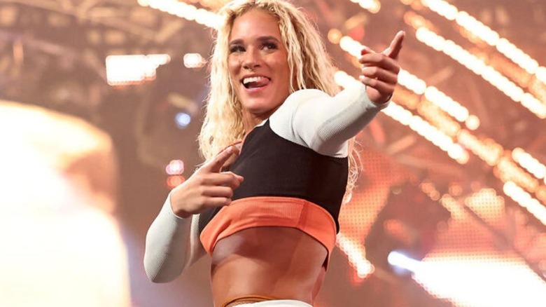 Sol Ruca poses while standing on the turnbuckle before a match on "WWE NXT."