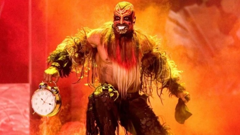 The Boogeyman makes his entrance, complete with clock and facepaint, ahead of a match in WWE.