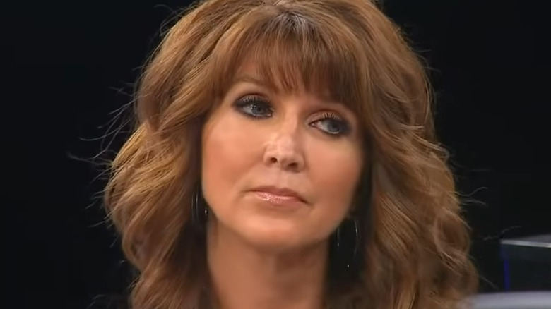 Dixie Carter tilts head