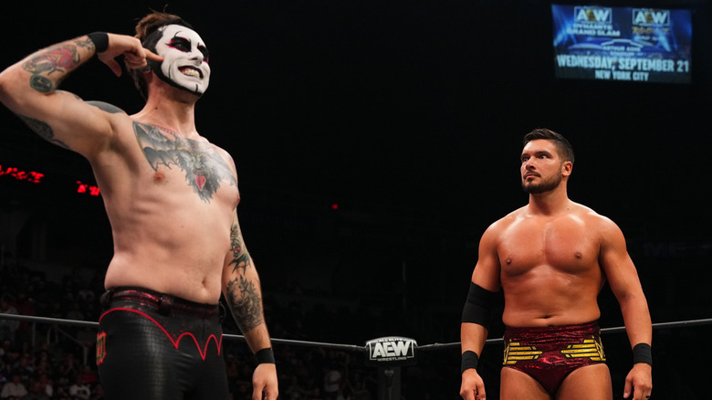 Danhausen and Ethan Page in the ring