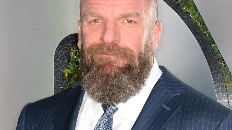 Triple H sonríe 