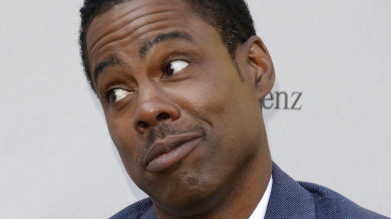 Chris Rock looking away