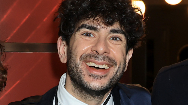 AEW CEO Tony Khan smiling