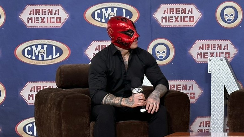 Villano III Jr. sitting down