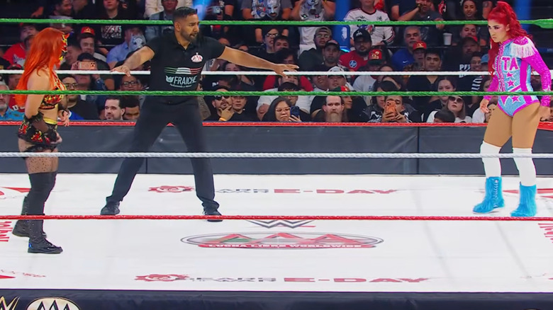 La Catalina faces off with Flammer in the ring