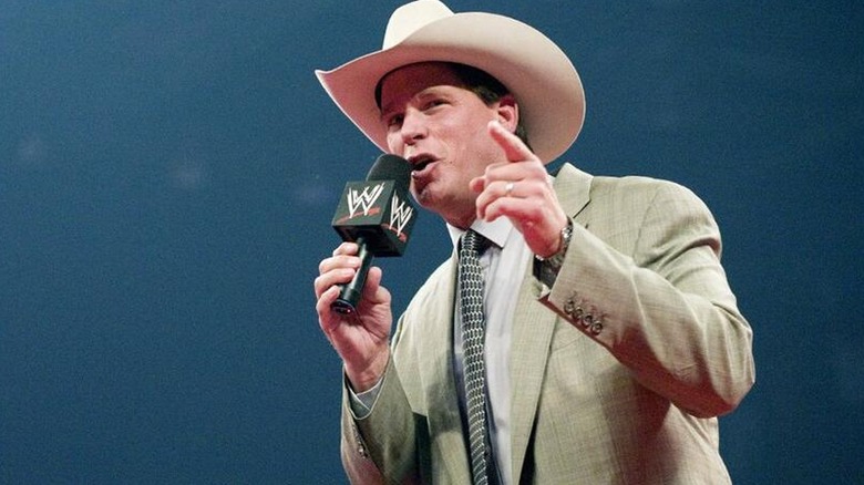 John 'Bradshaw' Layfield cutting a promo during a WWE show.