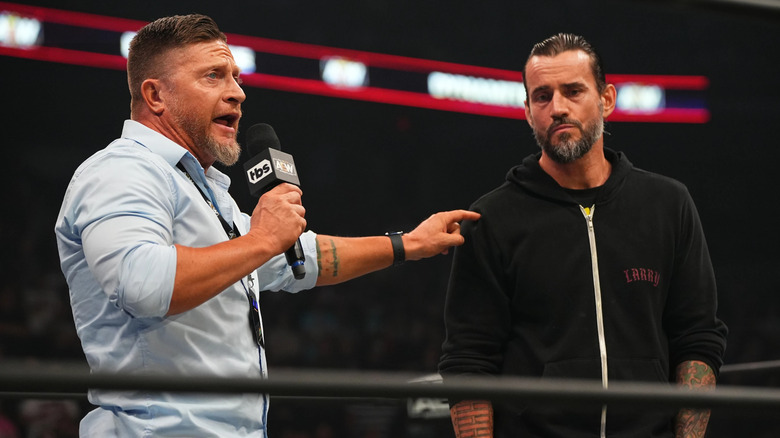 Ace Steel pointing at CM Punk