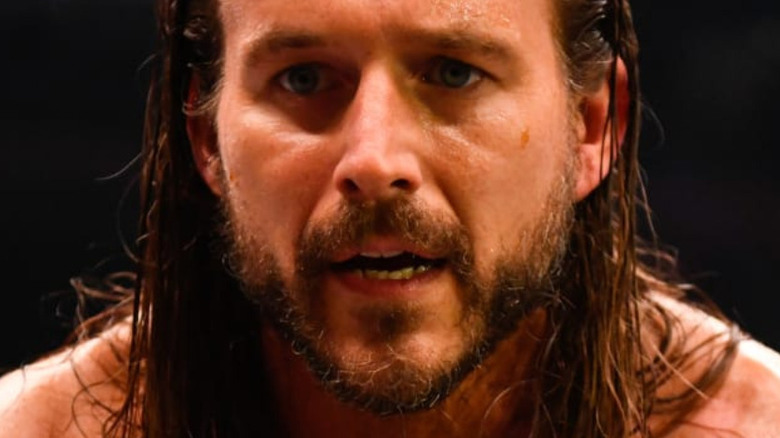 Adam Cole drops the mic after cutting a promo