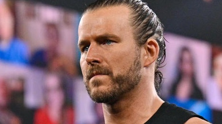 Adam Cole looking away