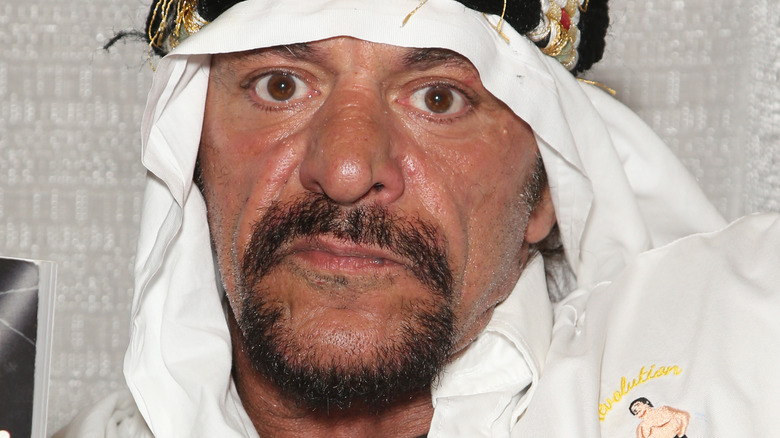 Sabu posing for a photo