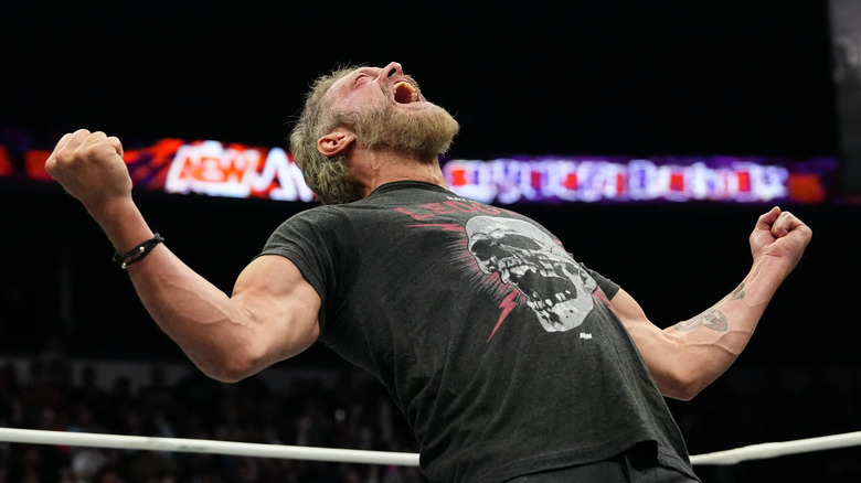 Adam Copeland poses in the ring after hitting a move during a beatdown on 