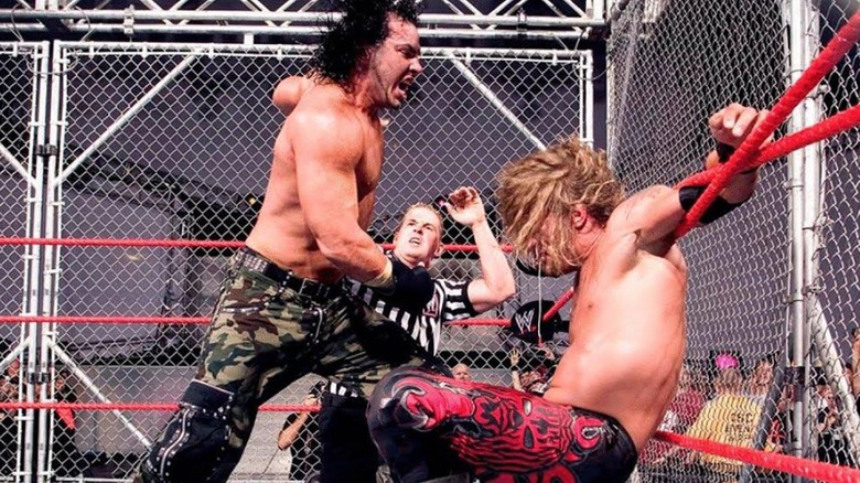 Matt Hardy battles Edge in a steel cage 