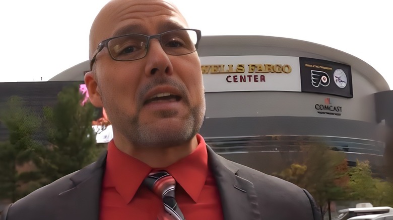 Adam Pearce in front of the Wells Fargo Center