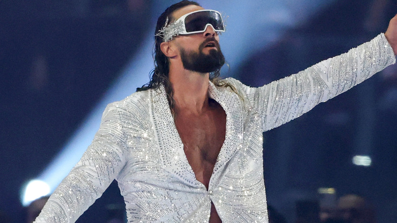 Seth Rollins is wearing a silver sparkly jacket