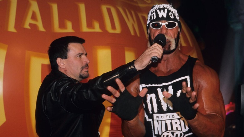 Eric Bischoff interviewing Hollywood Hulk Hogan at WCW Halloween Havoc