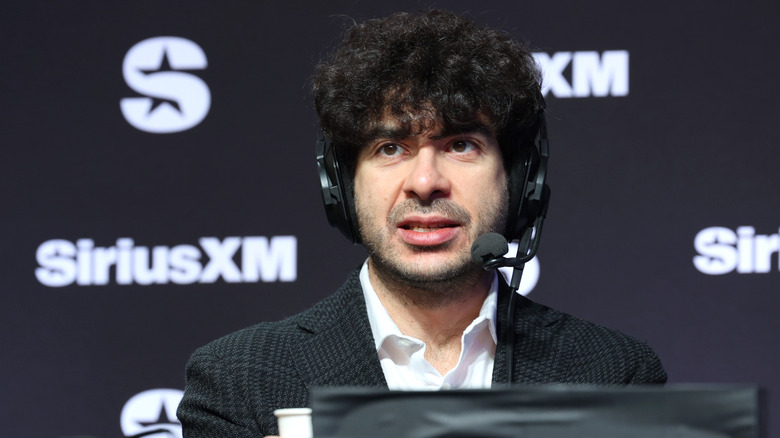 Tony Khan speaks on SiriusXM at Super Bowl LVIII on February 08, 2024 in Las Vegas, Nevada.