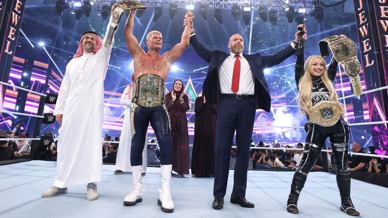 Cody Rhodes, Triple H, and Liv Morgan at WWE Crown Jewel 2024
