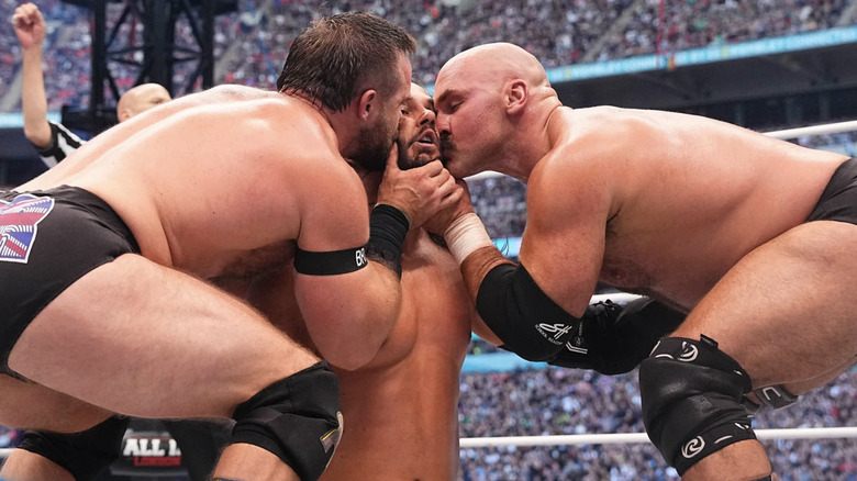 FTR kissing Matt Jackson's cheeks
