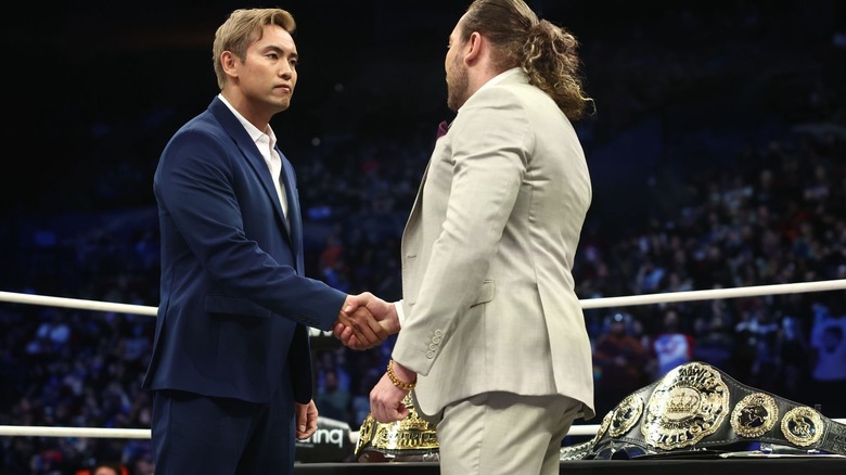 Kazuchika Okada and Kenny Omega shake hands