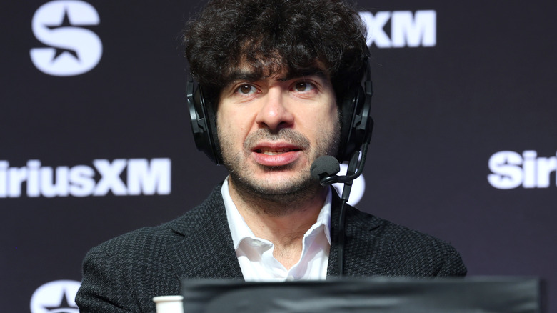 Tony Khan wearing a headset