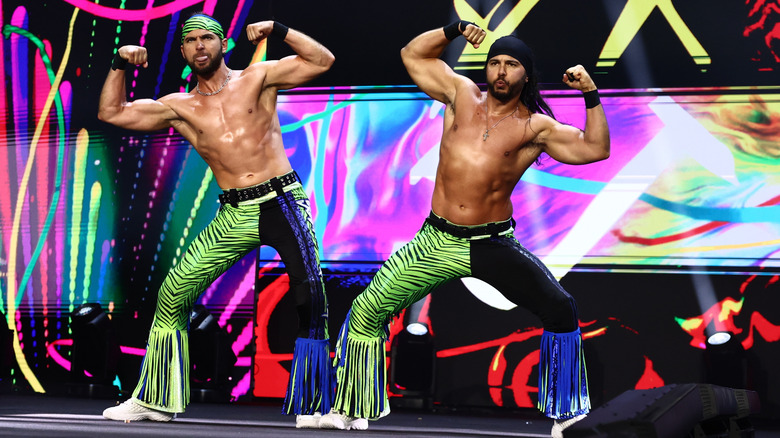 The Young Bucks hit their pose on the stage before teaming up with Adam Copeland for a match on the August 26, 2026 edition of "AEW Dynamite."