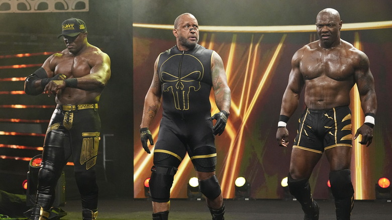 Bobby Lashley, MVP, and Shelton Benjamin head to the ring for their trios match against The Demand at AEW All Out.