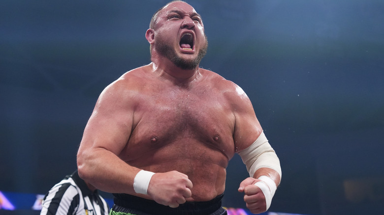 Samoa Joe hypes himself, and the crowd, up in the ring during a match on a January 2026 edition of "AEW Dynamite."