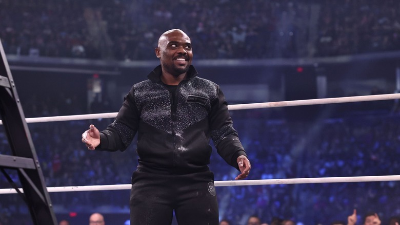 Stokely Hathaway looks excited in the middle of the ring