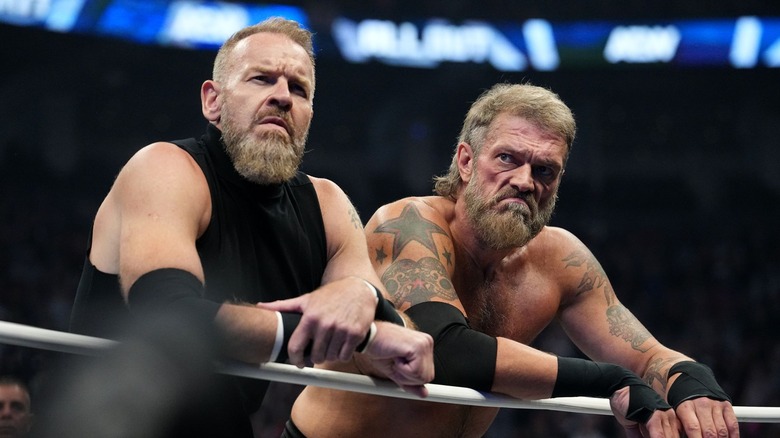 Cope and Christian lean on the ropes.