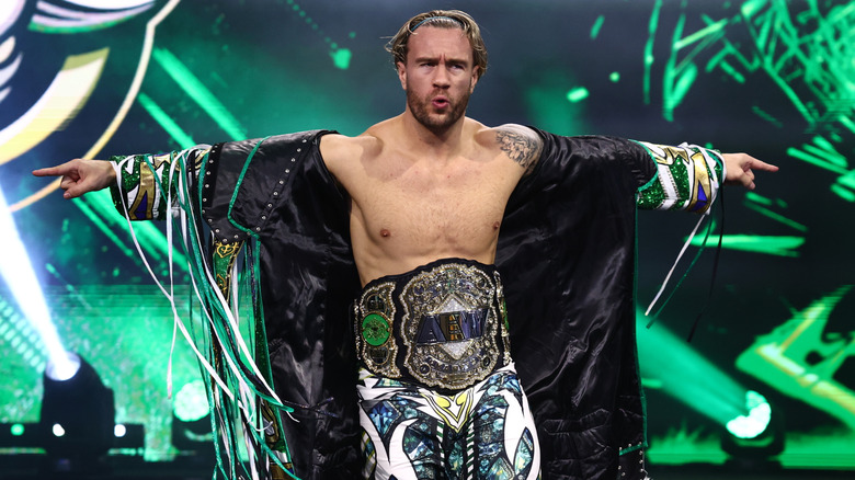 Will Ospreay with arms outstretched