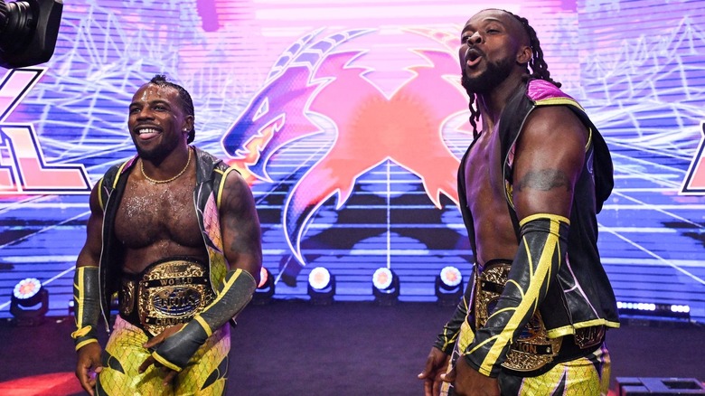 Austin Creed and Kofi walking to the ring