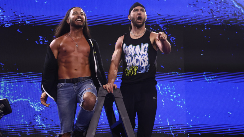 The Bucks standing on a ladder