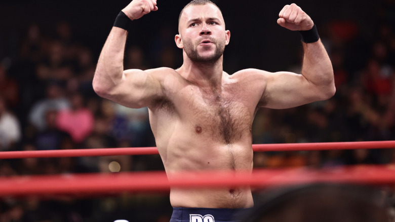 Garcia flexing his biceps in the ring