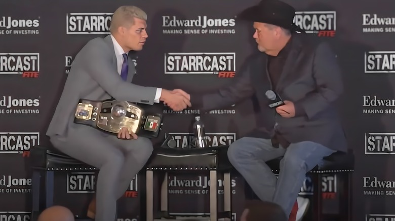 Cody Rhodes and Jim Ross shake hands