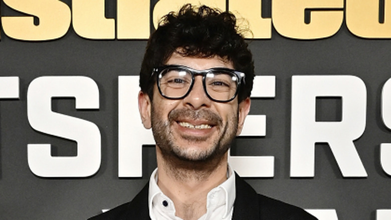 Tony Khan flashes a smile