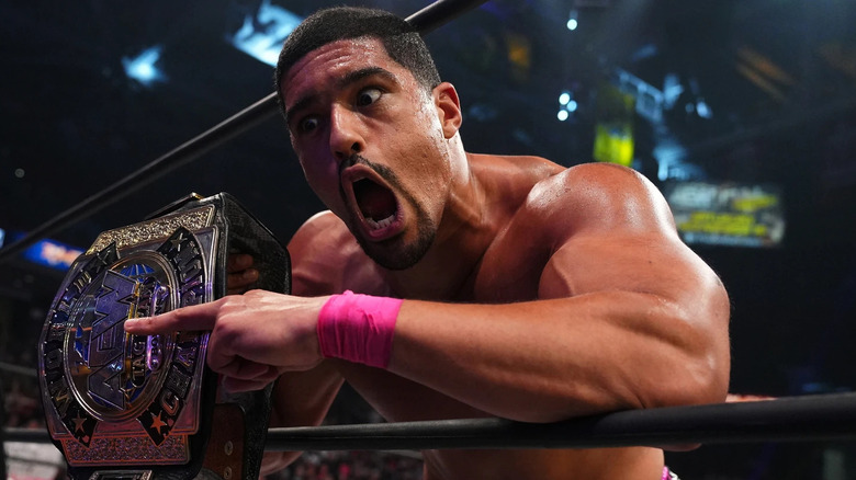 Anthony Bowens holding the AEW World Tag Team Championship