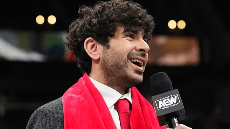 AEW President and CEO, Tony Khan, talks to the crowd at a live event