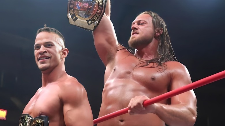 Ricky Starks and Big Bill with the AEW Titles