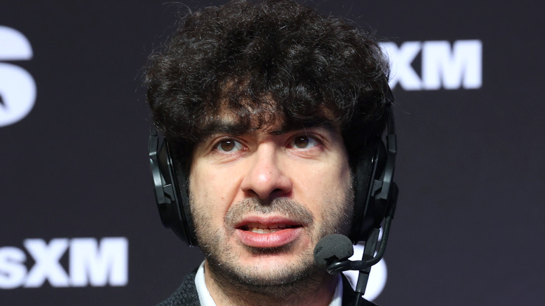 Tony Khan on a headset