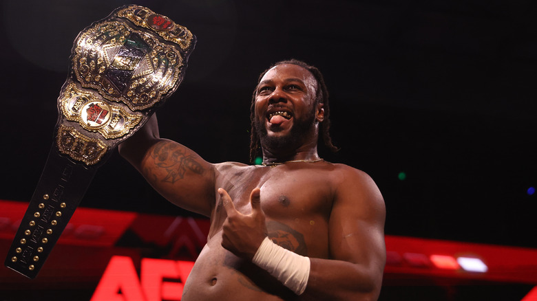 Swerve Strickland with AEW World Championship