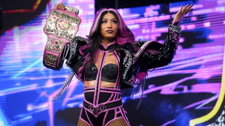 Mercedes Moné with the Owen Hart Cup title