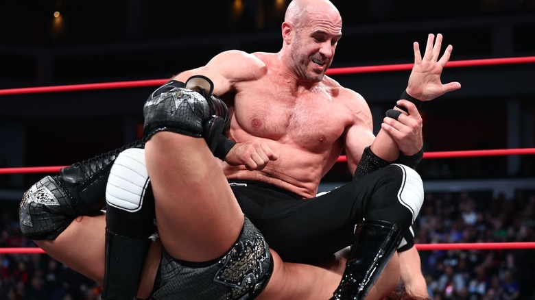 Claudio Castagnoli puts Konosuke Takeshita in a submission