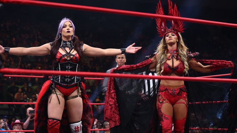Divine Dominion pose in the ring