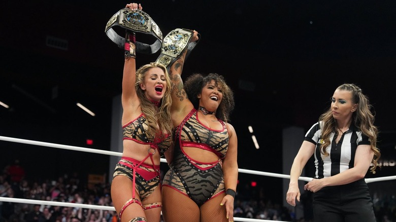 Babes of Wrath celebrate in the ring