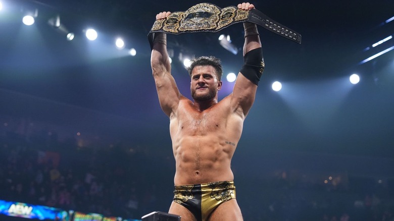 MJF poses with the title