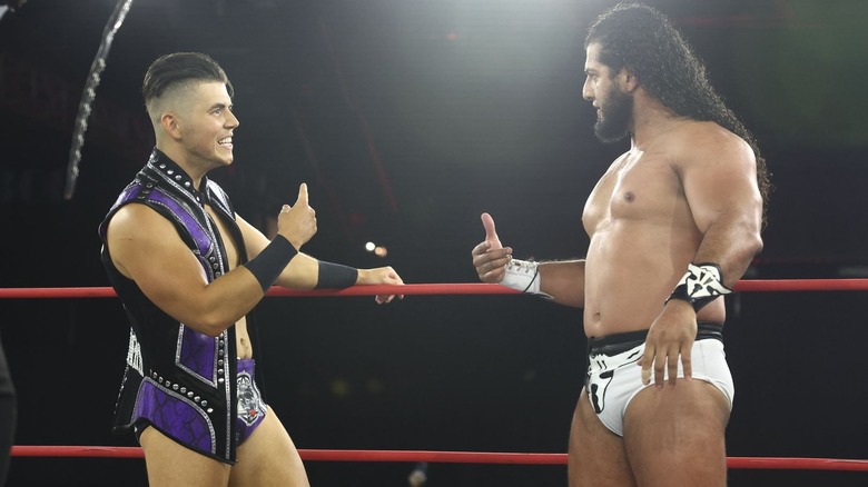 Sammy Guevara and RUSH in the ring