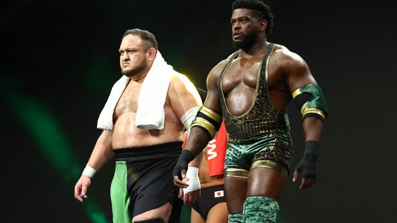 Samoa Joe and Powerhouse Hobbs walk to the ring