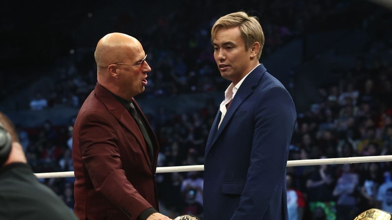 Don Callis in the ring with Okada
